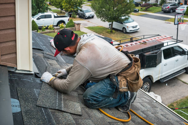 Professional Roof Replacement technician working in Nokomis, IL